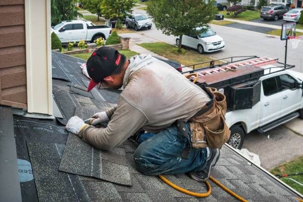 Professional Roofing technician working in Pluckemin, NJ